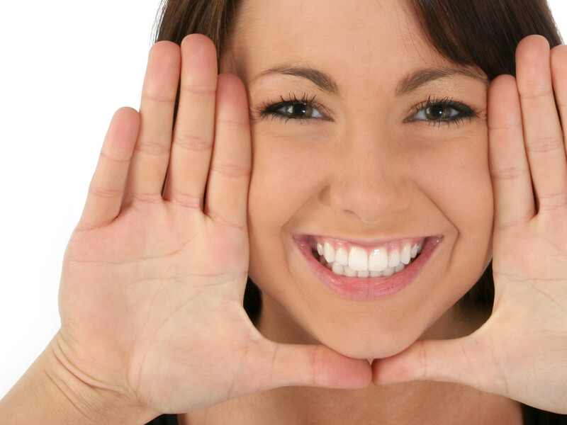 Woman Smiling After Dental Filling