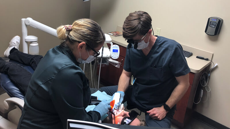 Dr Kitts with a dental patient in Edmonds