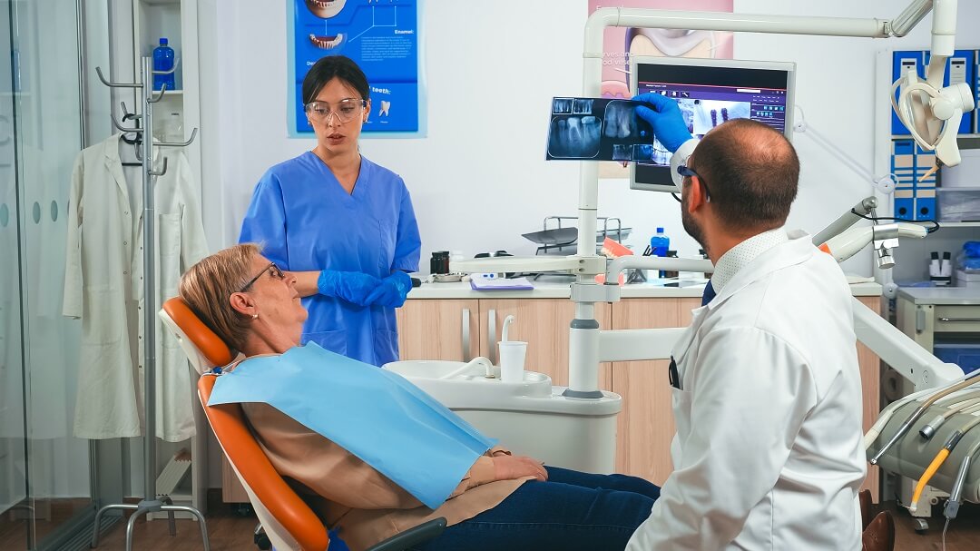 doctor discussing a plan for dental recovery