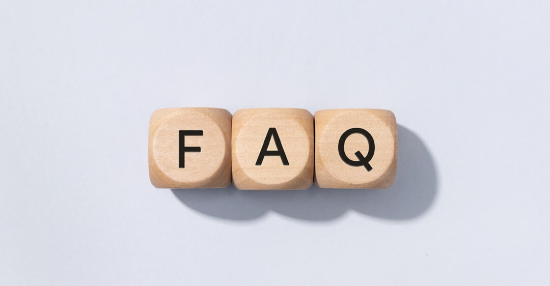 FAQ text on wooden cube blocks